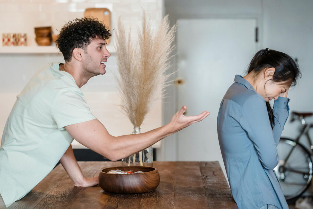 Two people arguing as part of their relationship vortex