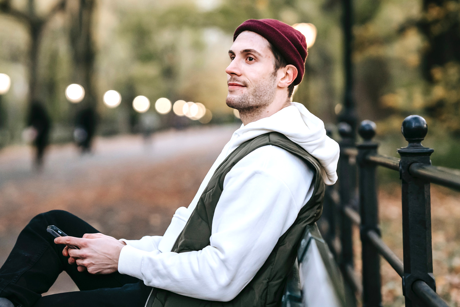 40 year old virgin man, sitting on a park bench